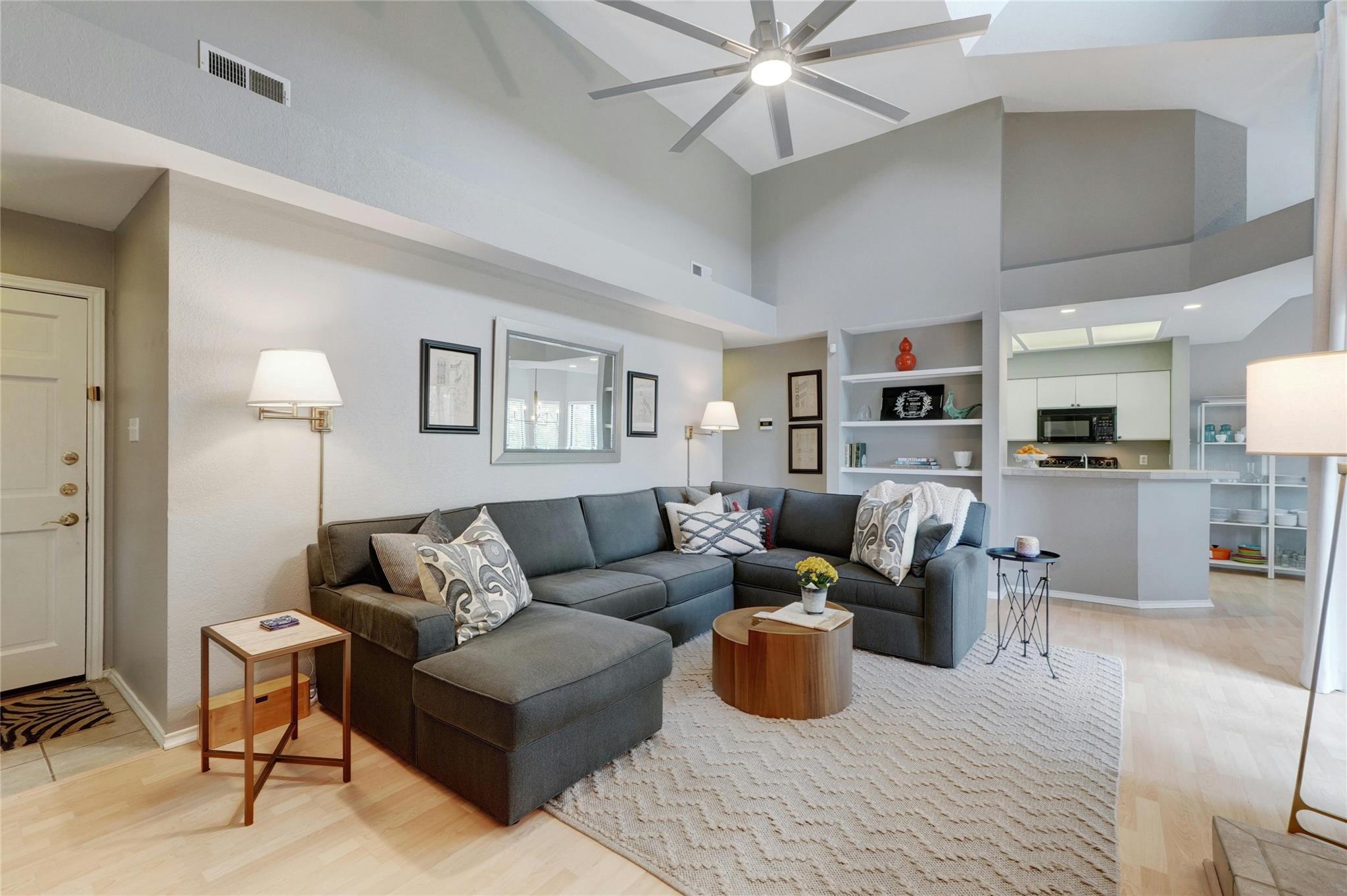 4711 Spicewood Springs Road, Unit 1201 Austin, TX 78759 - Photo 3 of 35 Entertain in the main living space that is open to the kitchen and dining