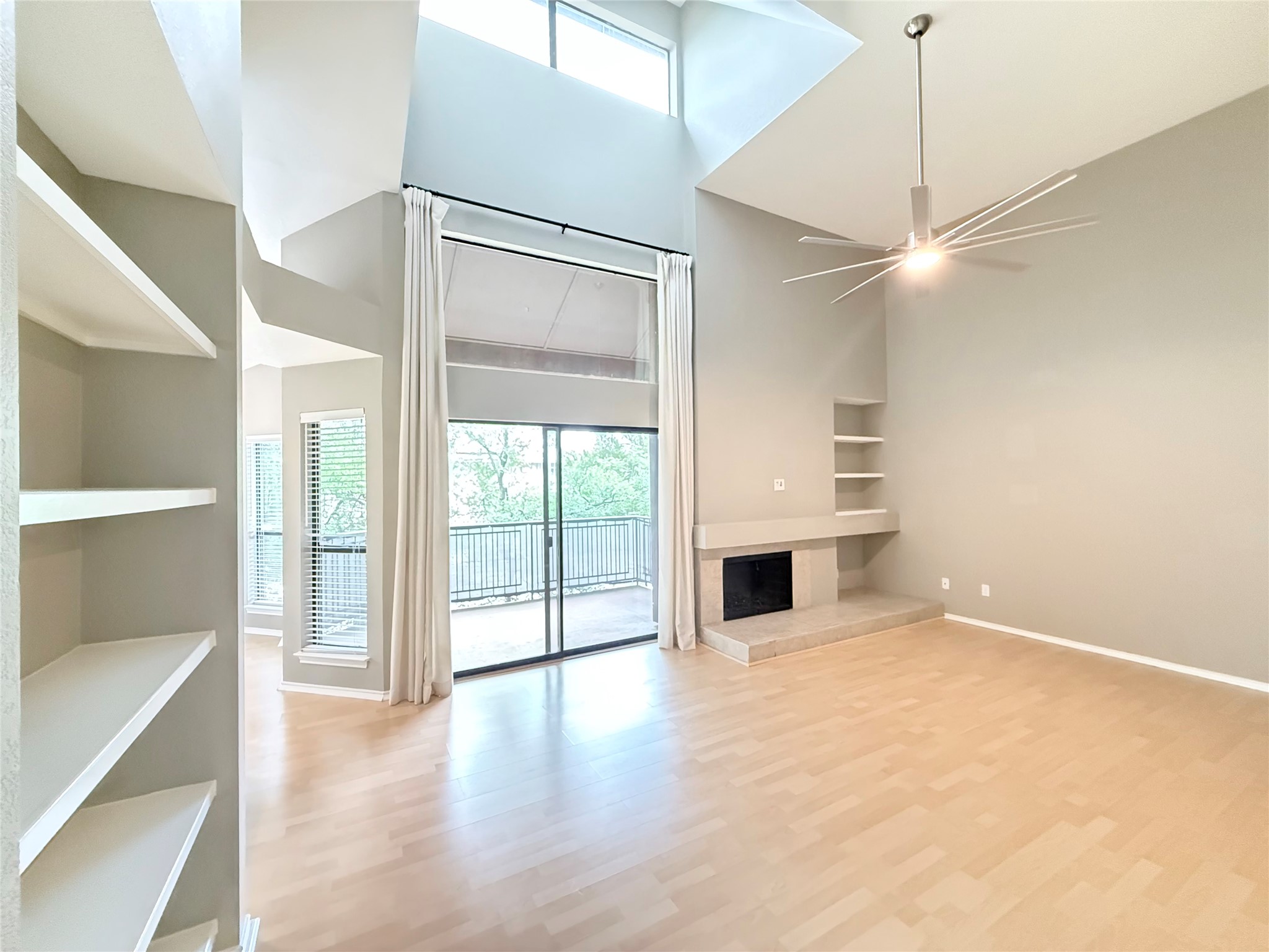 4711 Spicewood Springs Road, Unit 1201 Austin, TX 78759 - Photo 5 of 35 Unfurnished living room with so much space and light