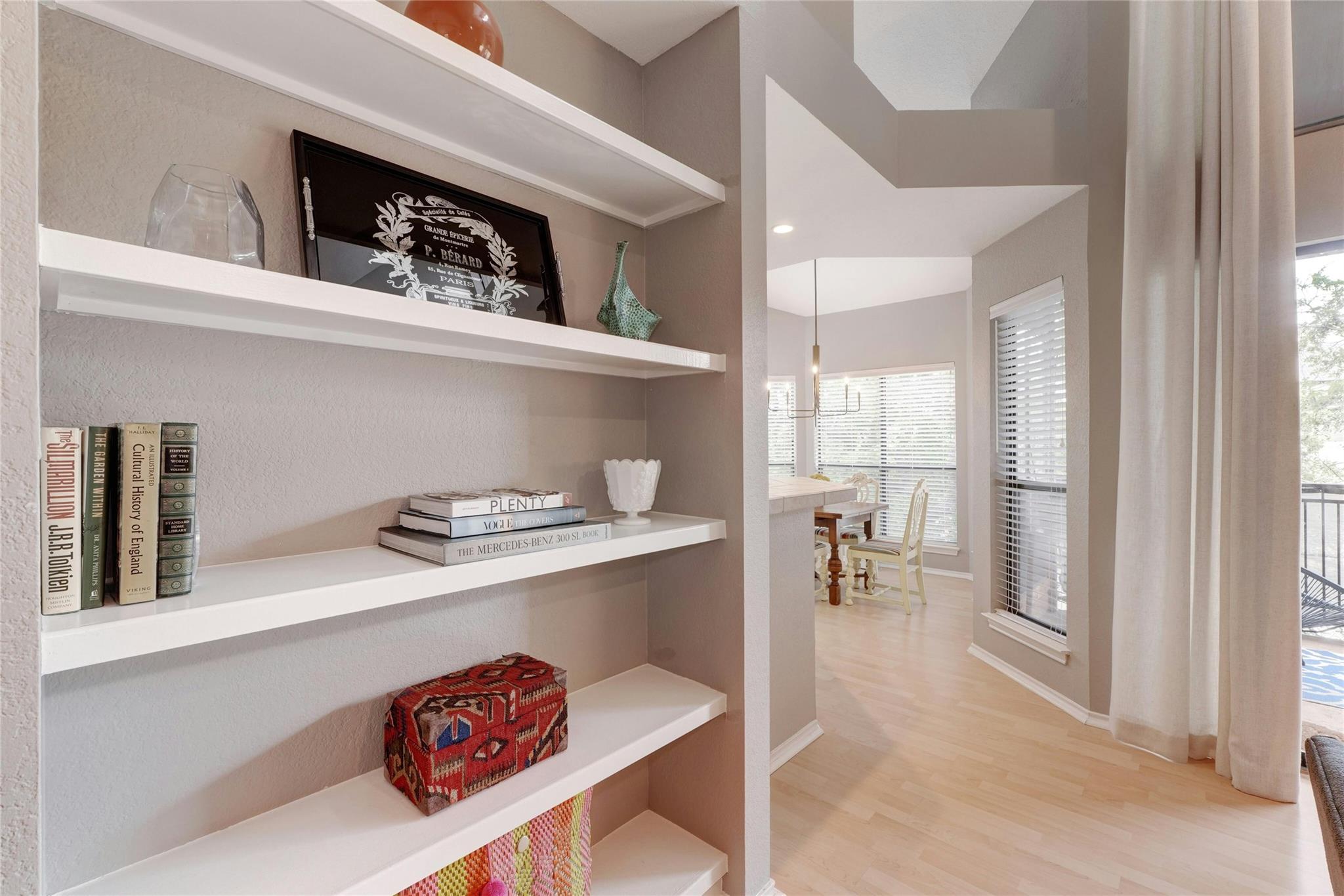 4711 Spicewood Springs Road, Unit 1201 Austin, TX 78759 - Photo 6 of 35 Built-in shelving adds charm and practical display space