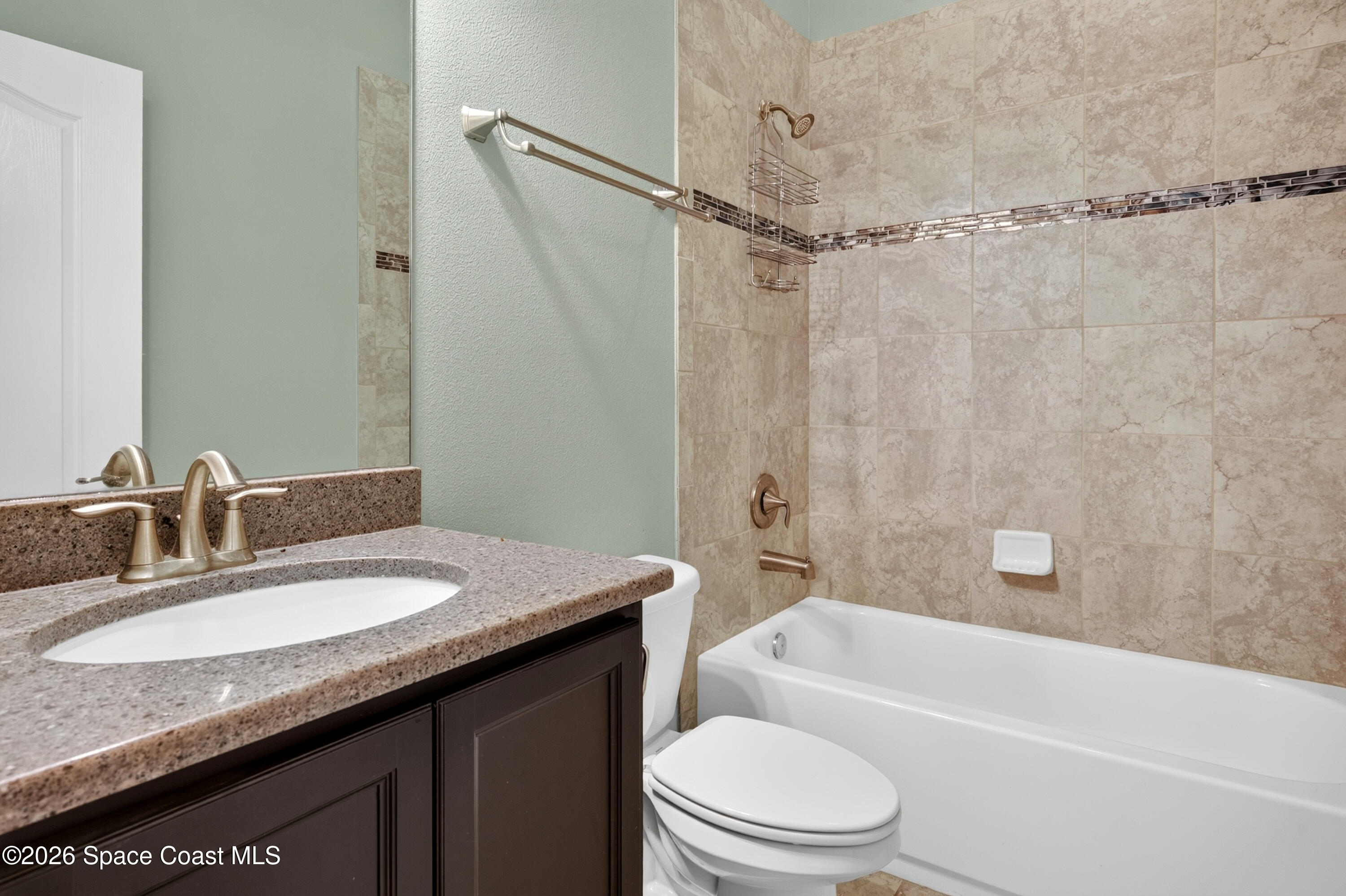 1475 Dalbora Road Merritt Island, FL 32953 - Photo 44 of 57 a bathroom with a granite countertop sink toilet and shower