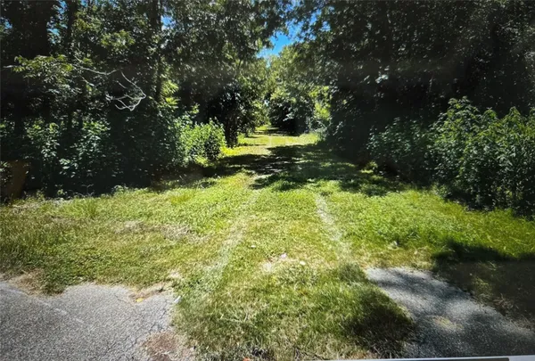 a view of outdoor space with a lake view