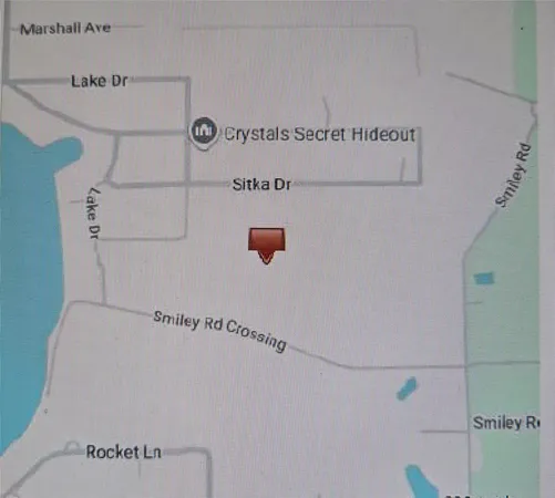 a bathroom with a shower and a sink