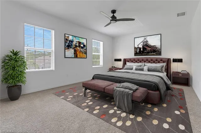 a bedroom with bed and a window