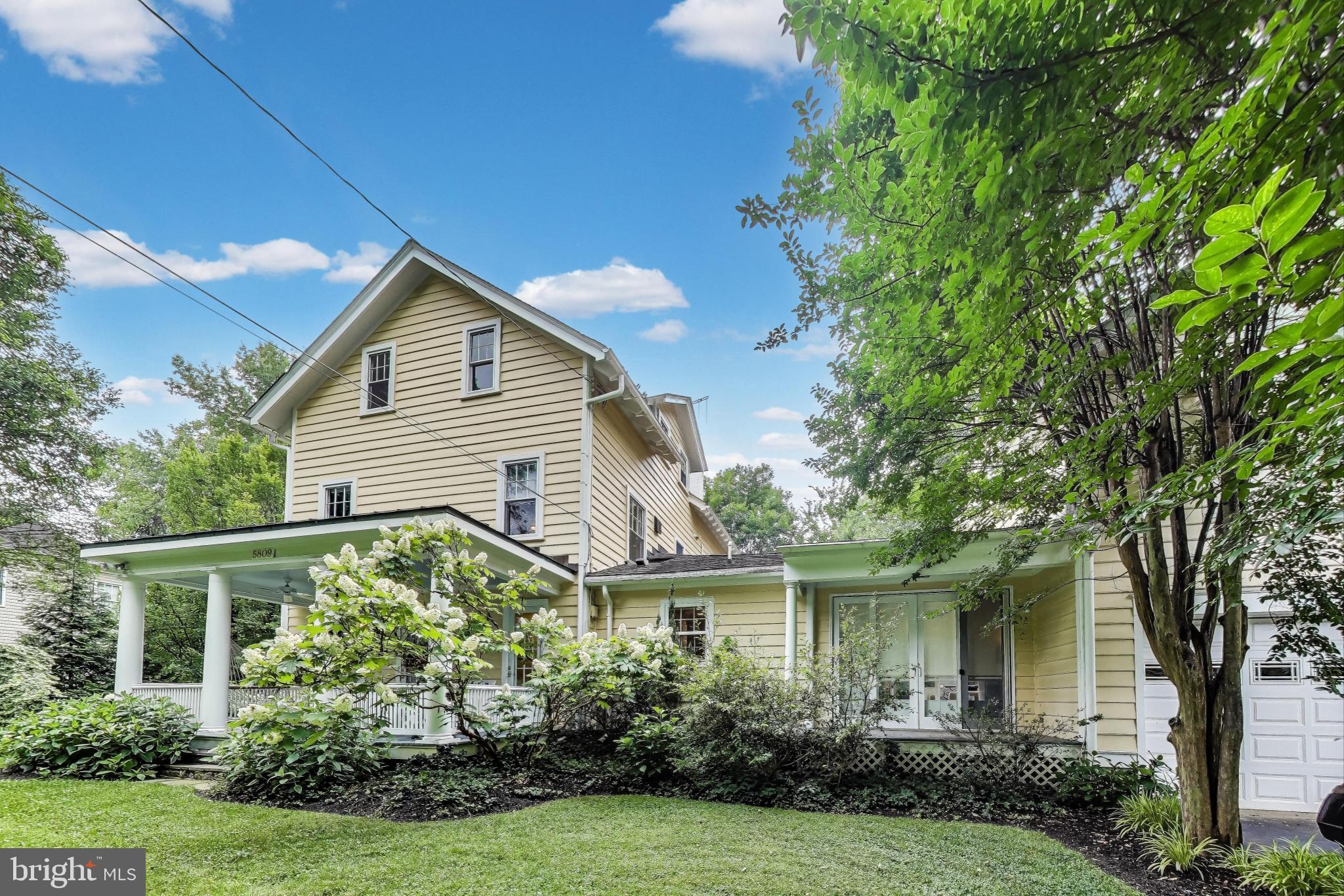 Classic Farmhouse Tucked Away on a Private Drive