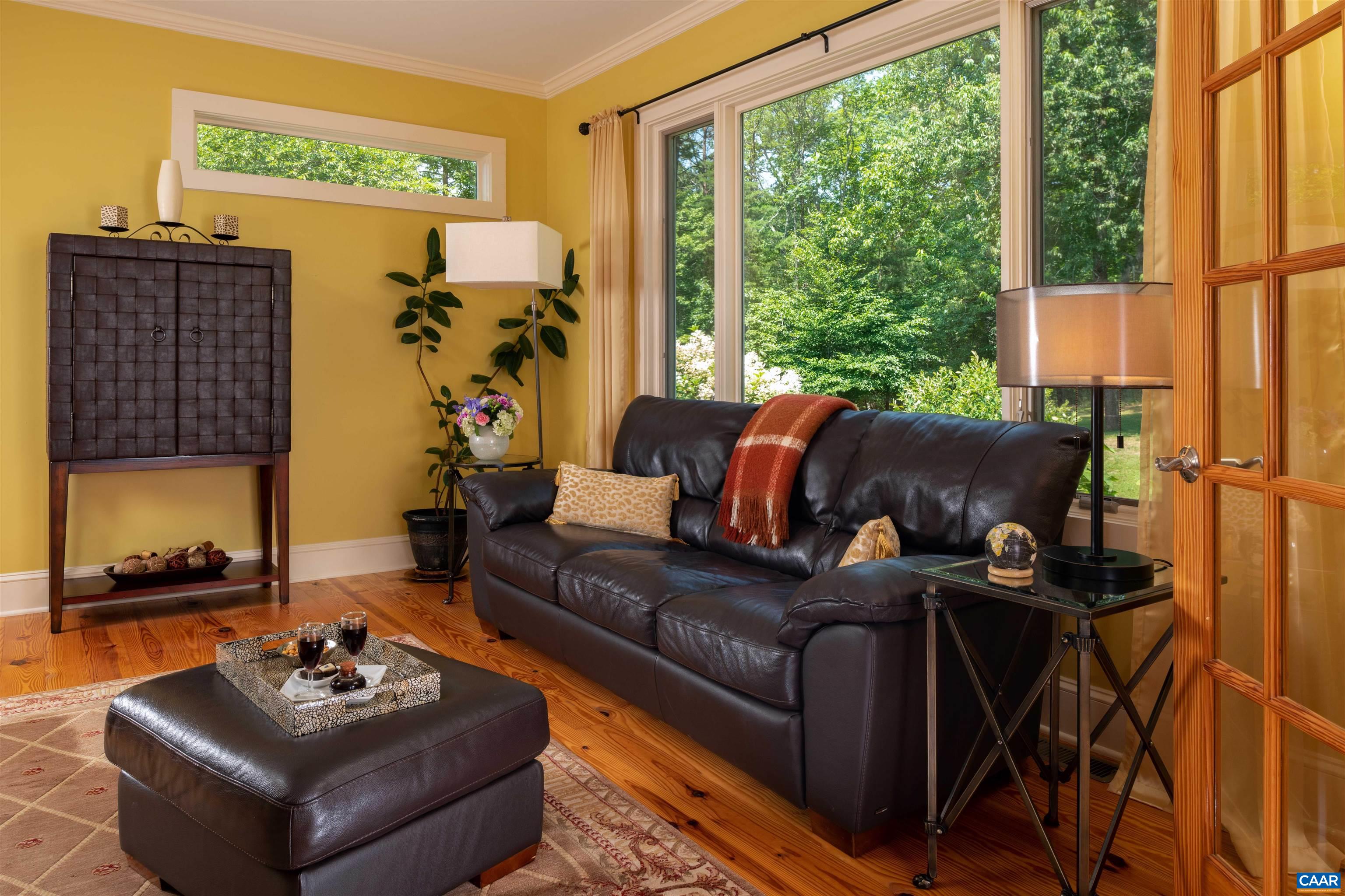 1495 Milton Road Charlottesville, VA 22902 - Photo 13 of 49 a living room with furniture and a window