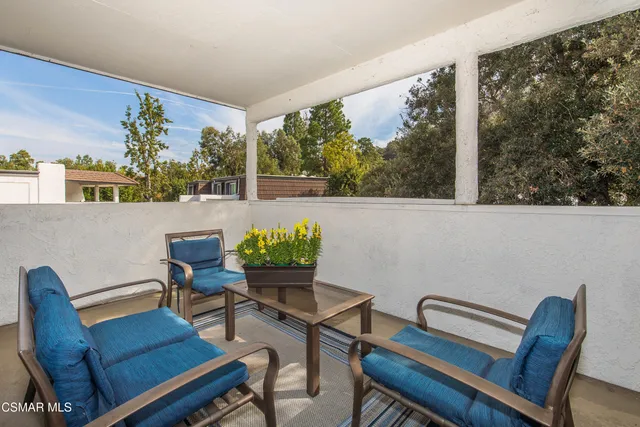 a view of a chairs and table in a room