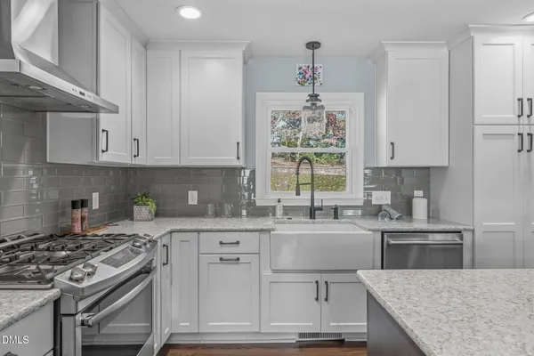 an aerial view of residential house with outdoor space