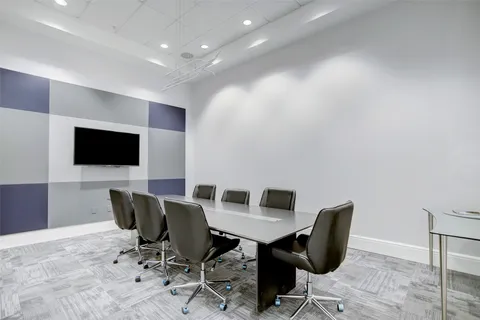 a room with lots of gym equipment