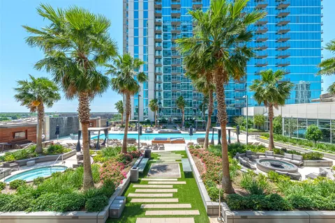 a view of swimming pool with outdoor seating