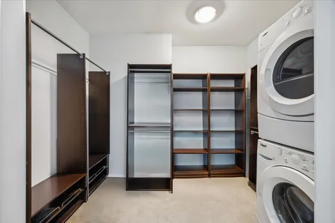 a view of a storage & utility room with washer and dryer