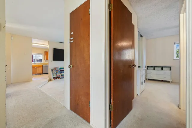 a view of livingroom with furniture and window