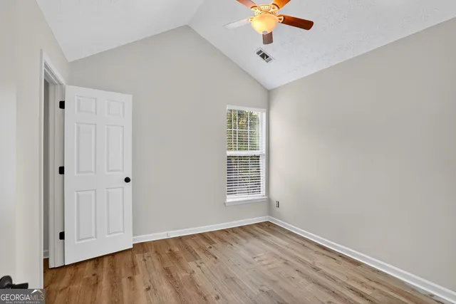a view of a room with racks on the wall