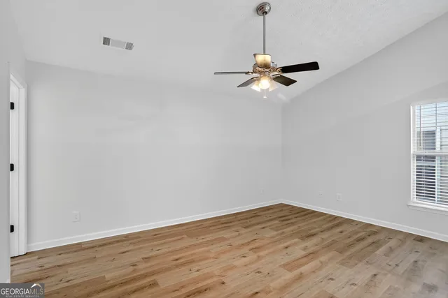 a bathroom with a sink and shower