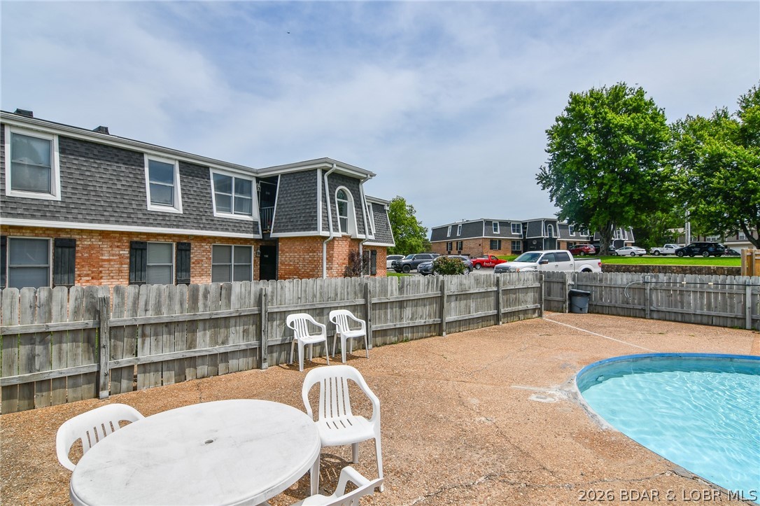 1118 Passover Road, Unit E216 Osage Beach, MO 65065 - Photo 28 of 31 View of condo location from the pool (top floor)