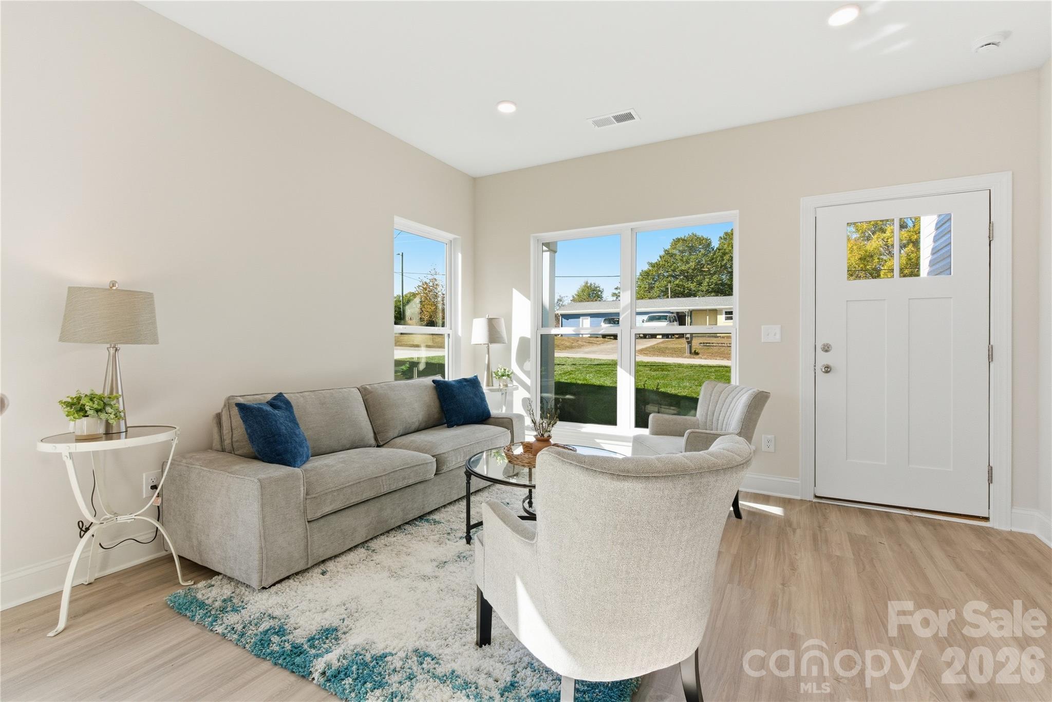 222 1st Street South Fort Mill, SC 29708 - Photo 21 of 23 a living room with furniture and a large window