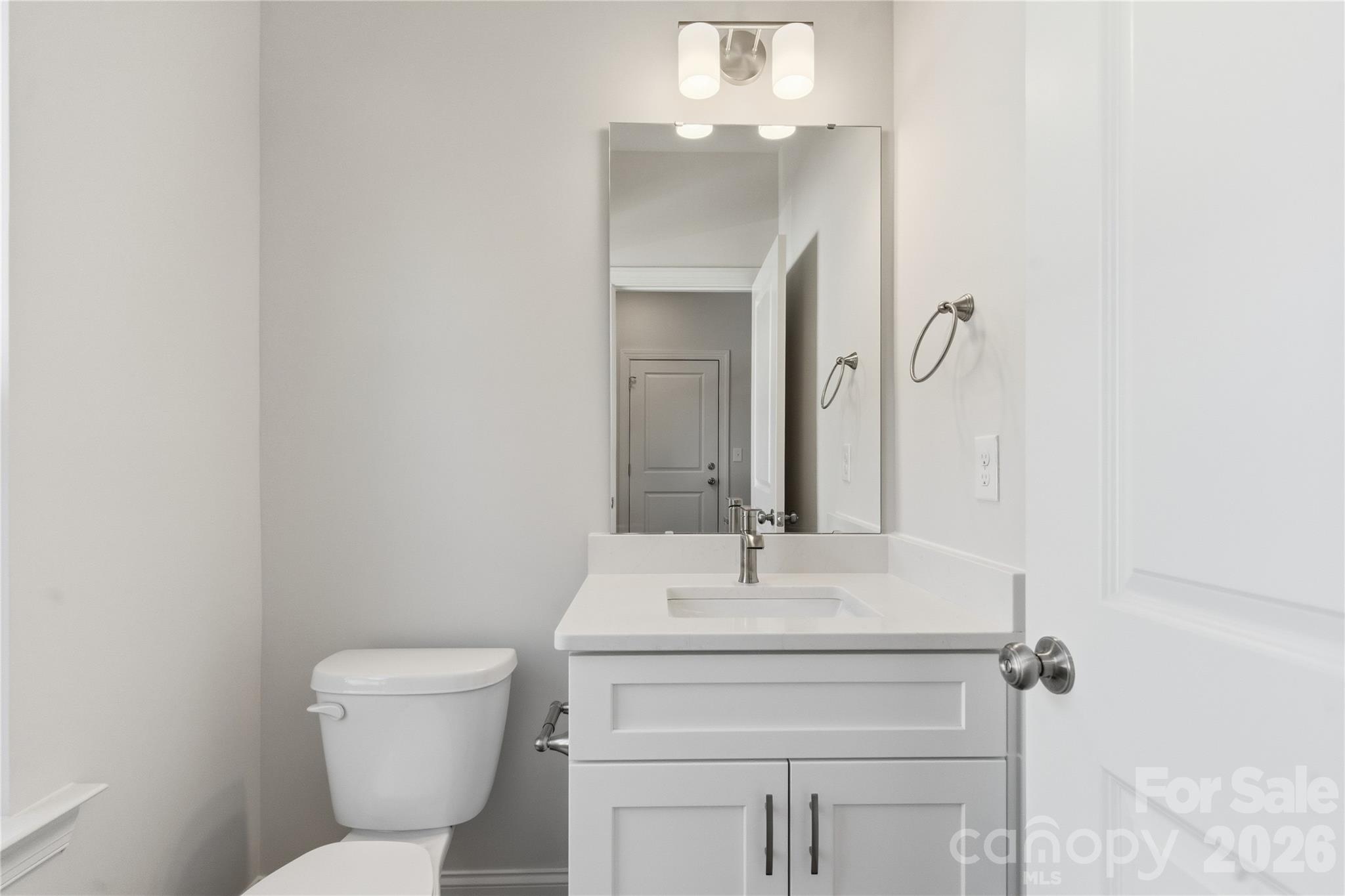 222 1st Street South Fort Mill, SC 29708 - Photo 9 of 23 a bathroom with a sink toilet and mirror