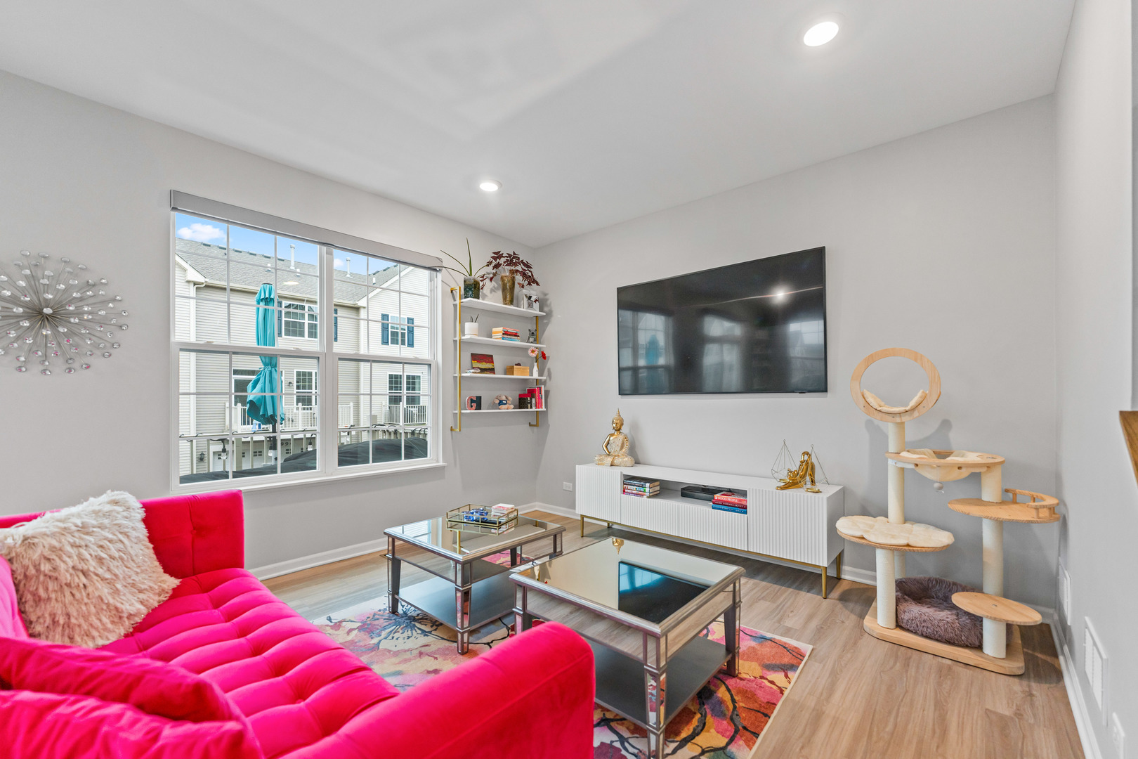 1627 Sager Way Batavia, IL 60510 - Photo 11 of 30 a living room with furniture and a flat screen tv