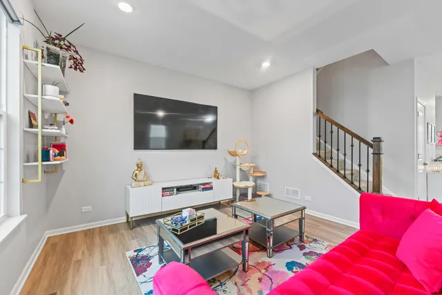 a bathroom with a sink mirror and toilet