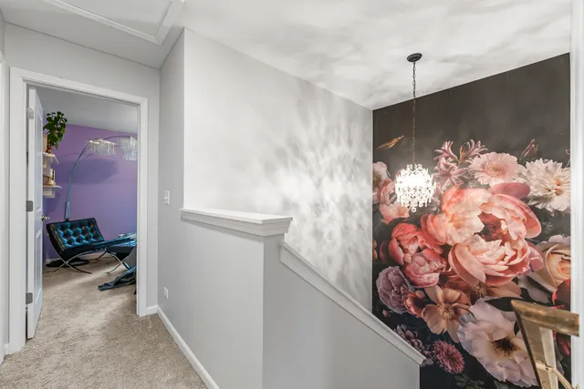 a view of a hallway with a white walls