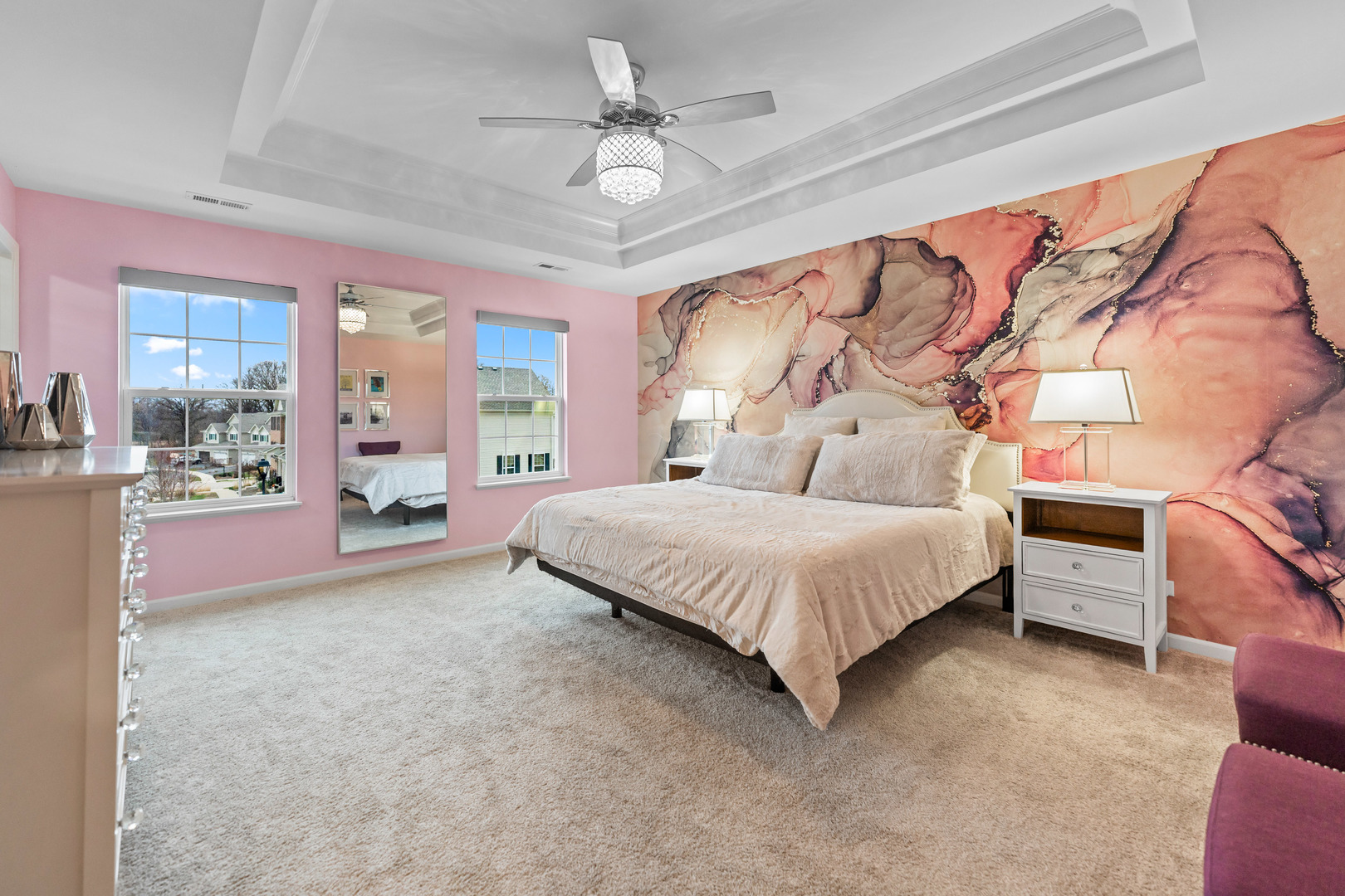 1627 Sager Way Batavia, IL 60510 - Photo 18 of 30 a spacious bedroom with a large bed a chandelier and windows