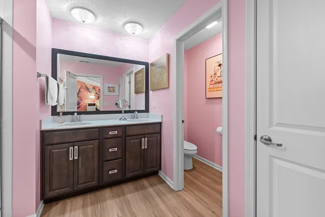 a bathroom with a shower and a sink