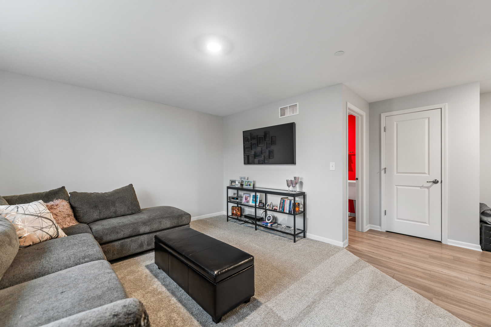 1627 Sager Way Batavia, IL 60510 - Photo 28 of 30 a living room with furniture and a flat screen tv