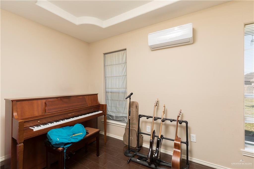 1801 Largo Street Weslaco, TX 78596 - Photo 17 of 20 a view of a room with furniture
