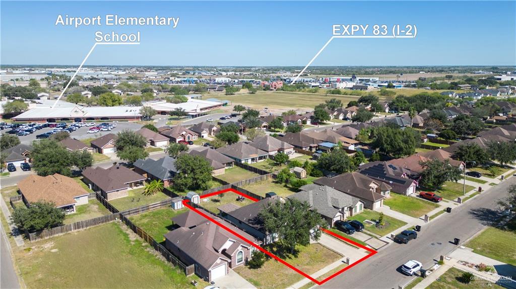 1801 Largo Street Weslaco, TX 78596 - Photo 19 of 20 an aerial view of residential houses with outdoor space