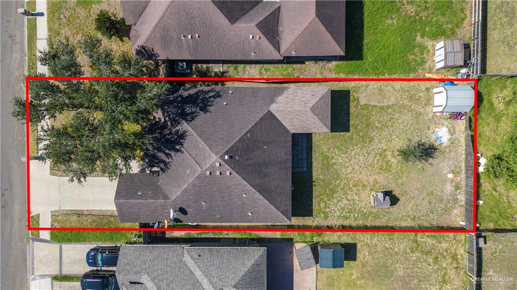 1801 Largo Street Weslaco, TX 78596 - Photo 9 of 20 an aerial view of multiple houses with yard