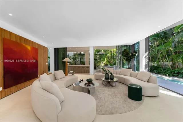 a kitchen with sink stove and refrigerator