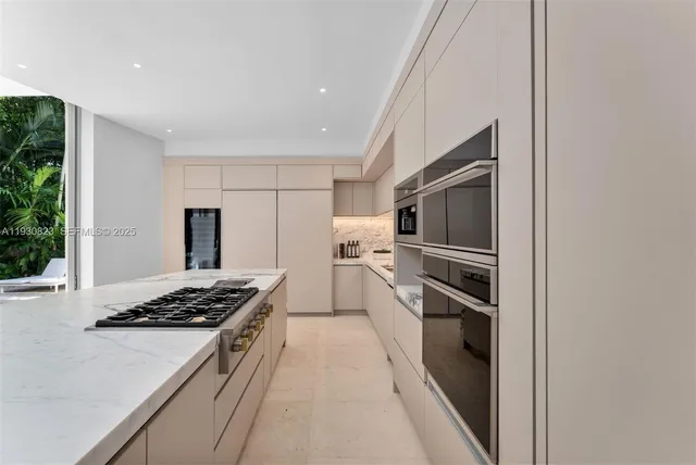 a view of an chairs and tables in the patio