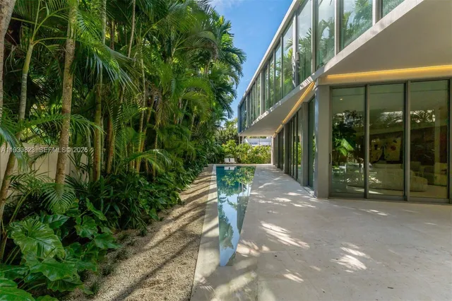 a bathroom with a double vanity sink and mirror
