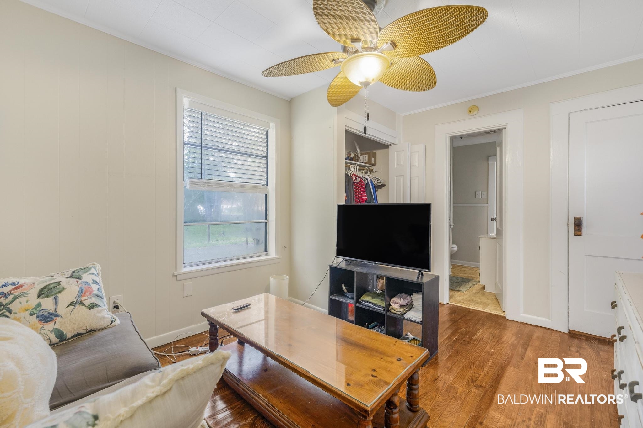 405 North Pine Street Foley, AL 36535 - Photo 28 of 33 Bedroom featuring wood finished floors, ceiling fan, and ornamental molding
