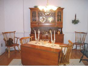 445 Brower Road Waynesboro, VA 22980 - Photo 3 of 6 a view of a dining room with furniture and chandelier