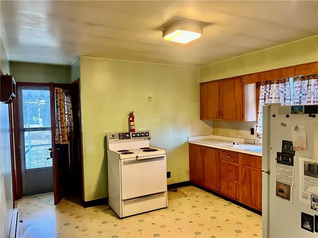 a bathroom with a sink a mirror and a bathtub