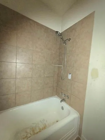 a bathroom with a bathtub