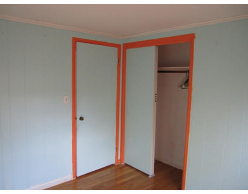 18 Leighton Road Boston, MA 02136 - Photo 8 of 11 a view of hallway with closet and wooden floor