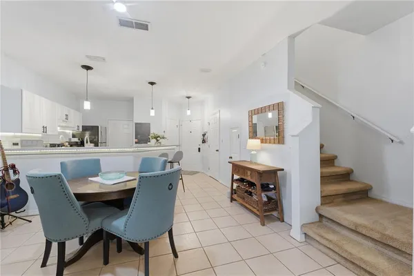 a view of a dining room with furniture