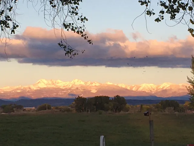a view of a lake with a mountain