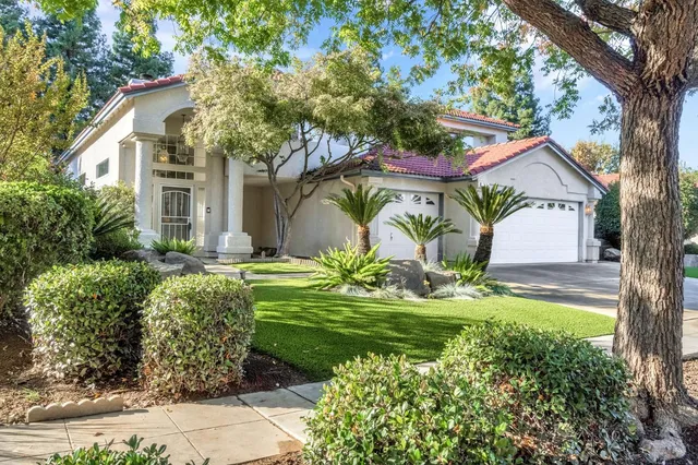 a view of a house with garden