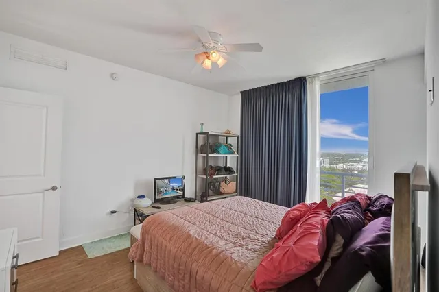 a bathroom with a double vanity sink toilet and shower