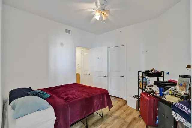 a bathroom with a shower and a sink