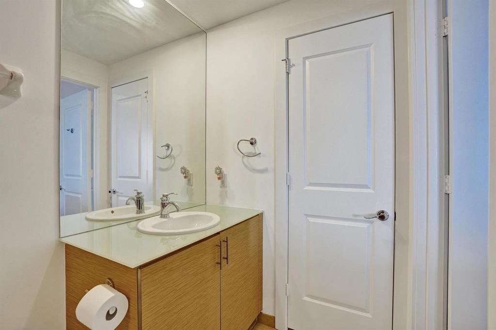 315 Northeast 3rd Avenue, Unit 1201 Fort Lauderdale, FL 33301 - Photo 18 of 49 a bathroom with a sink and a mirror