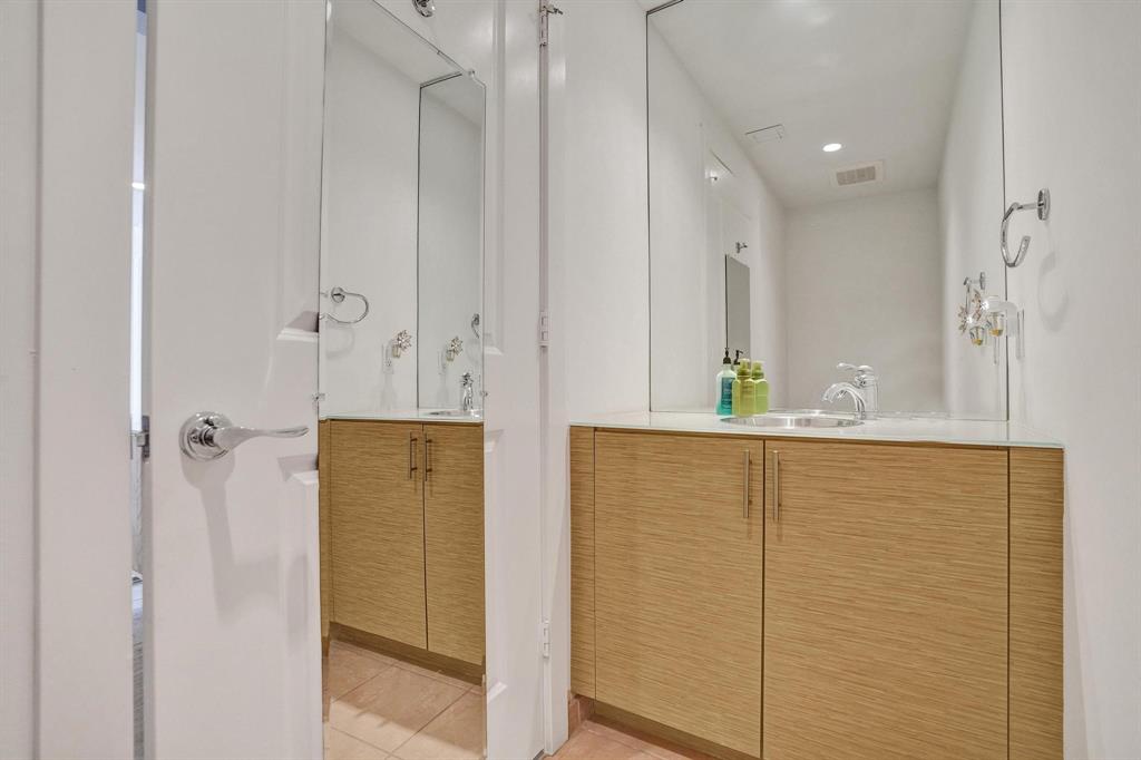 315 Northeast 3rd Avenue, Unit 1201 Fort Lauderdale, FL 33301 - Photo 19 of 49 a bathroom with a shower and a sink