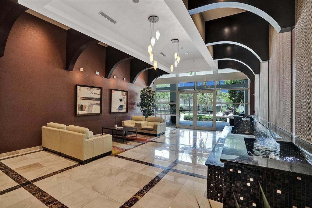 315 Northeast 3rd Avenue, Unit 1201 Fort Lauderdale, FL 33301 - Photo 45 of 49 a living room with furniture and floor to ceiling window