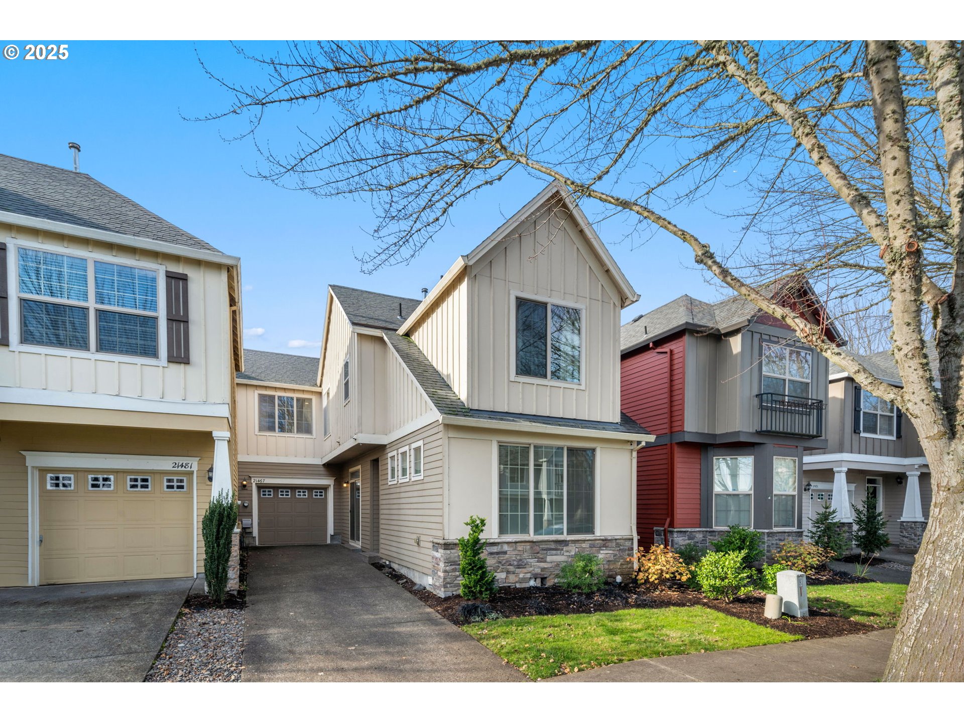 a front view of a house with a yard