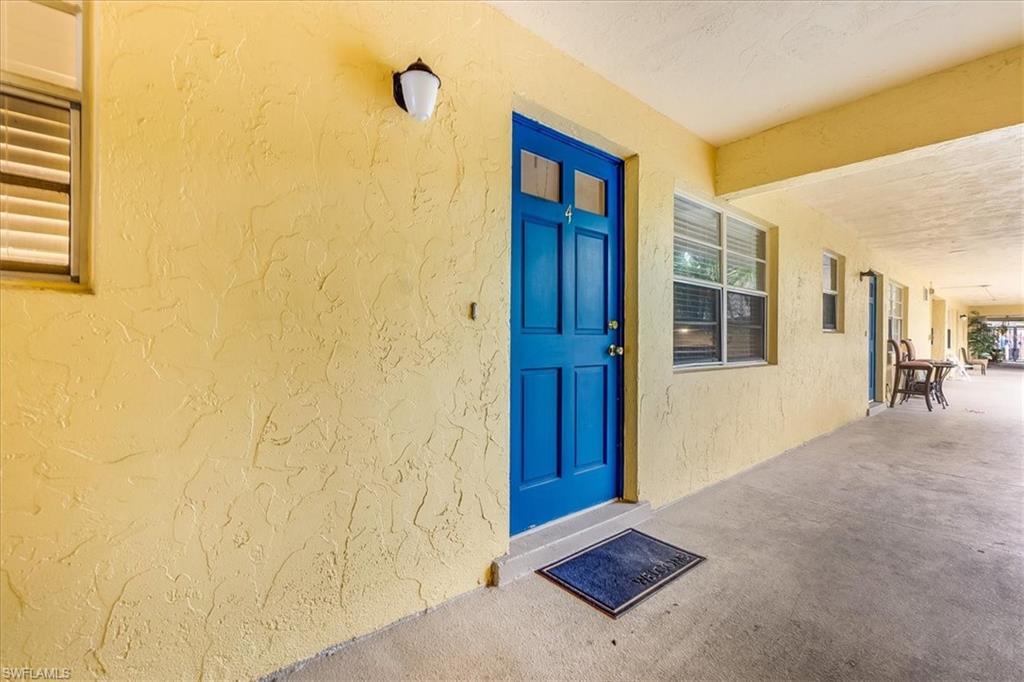 4290 Gulfstream Drive, Unit 4 Naples, FL 34112 - Photo 2 of 20 a view of an entryway