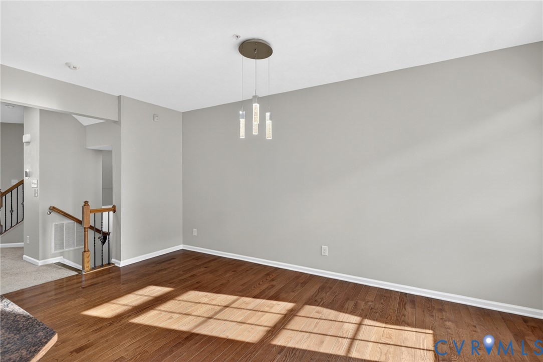 1903 Old Brick Road Glen Allen, VA 23060 - Photo 11 of 39 a view of a room with wooden floor and bedroom
