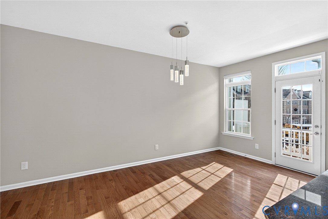 1903 Old Brick Road Glen Allen, VA 23060 - Photo 17 of 39 a view of an empty room with wooden floor and a window
