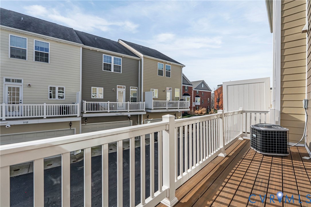 1903 Old Brick Road Glen Allen, VA 23060 - Photo 18 of 39 a view of a brick building from a balcony